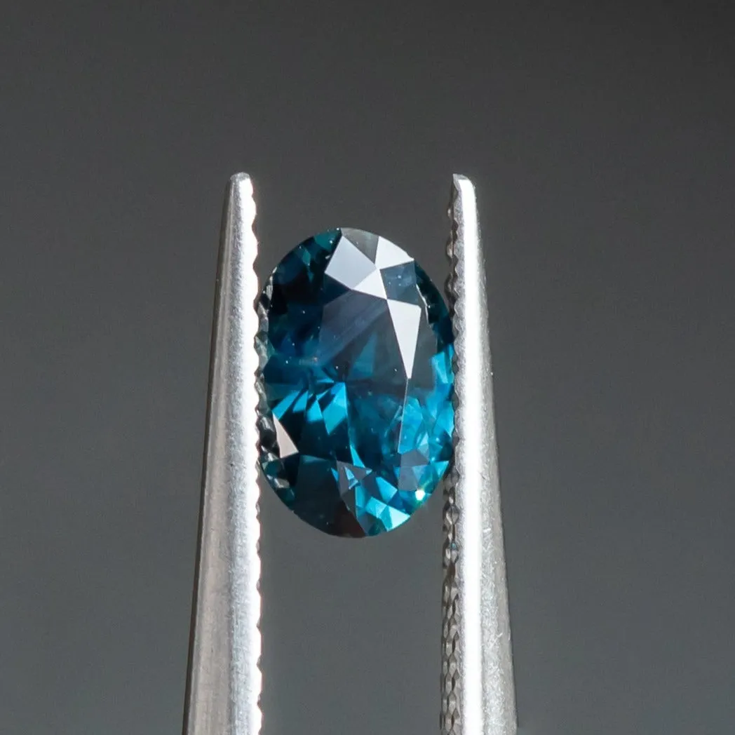 0.89CT OVAL NIGERIAN SAPPHIRE, DEEP OCEAN BLUE, 6.96X4.93MM, UNTREATED