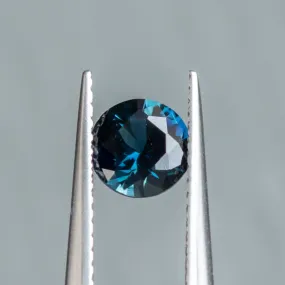 0.97CT ROUND BRILLIANT NIGERIAN SAPPHIRE, DEEP TEAL, 5.98X3.64MM, UNTREATED.