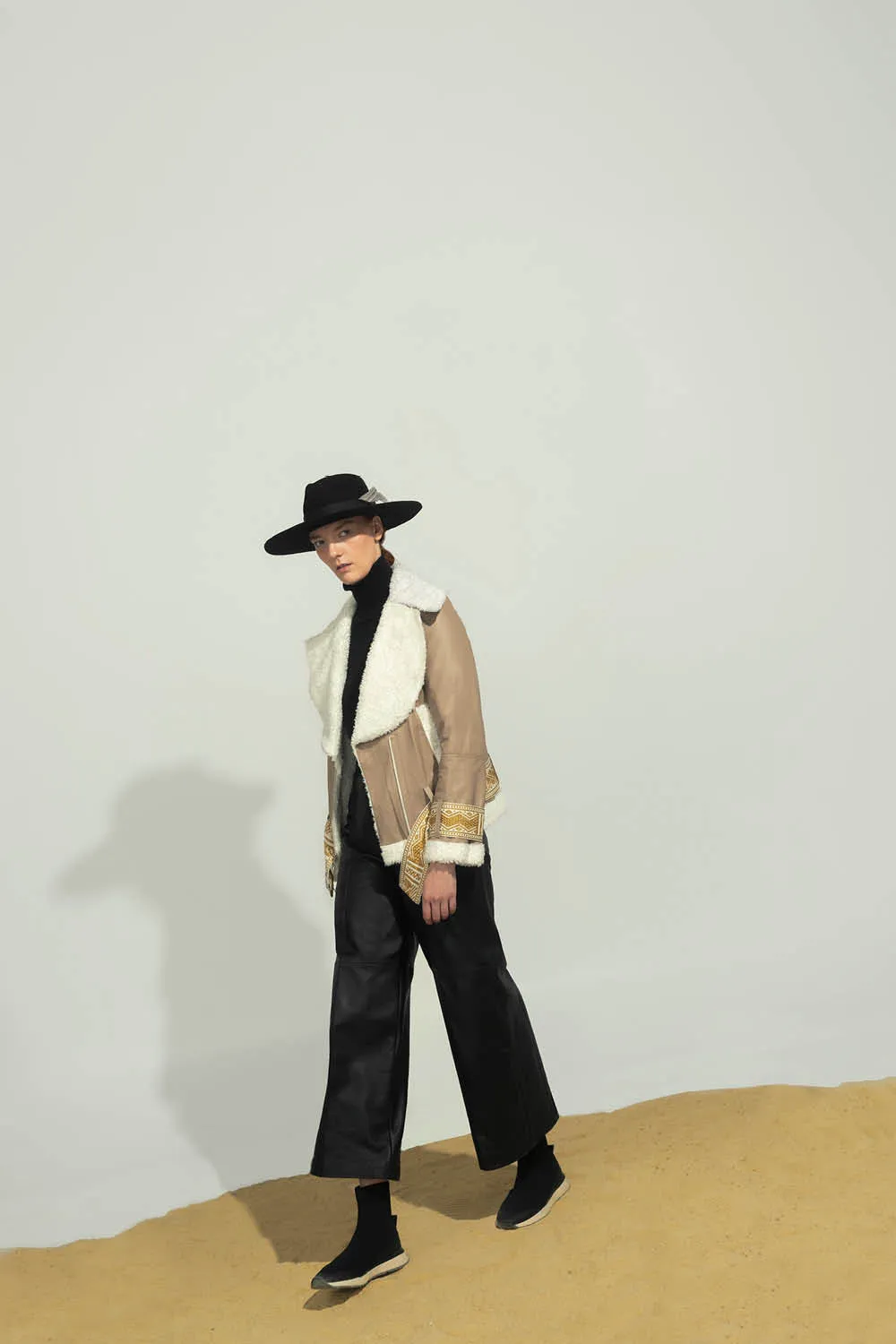 LEATHER CHUMBE JACKET IN SAND / IVORY GOLD HANDCUFFS AND BELT